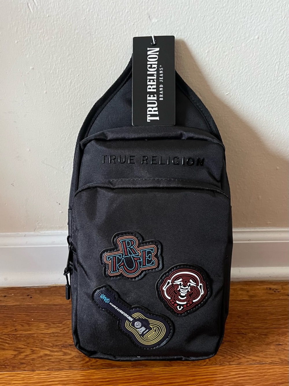 True Religion Black Sling Bag with Embroidered Patches